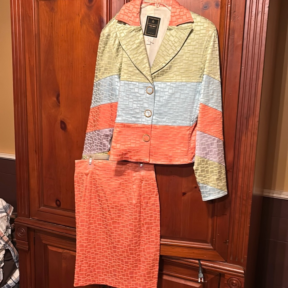Beautiful ladies skirt and jacket size Medium in salmon, light blue and green